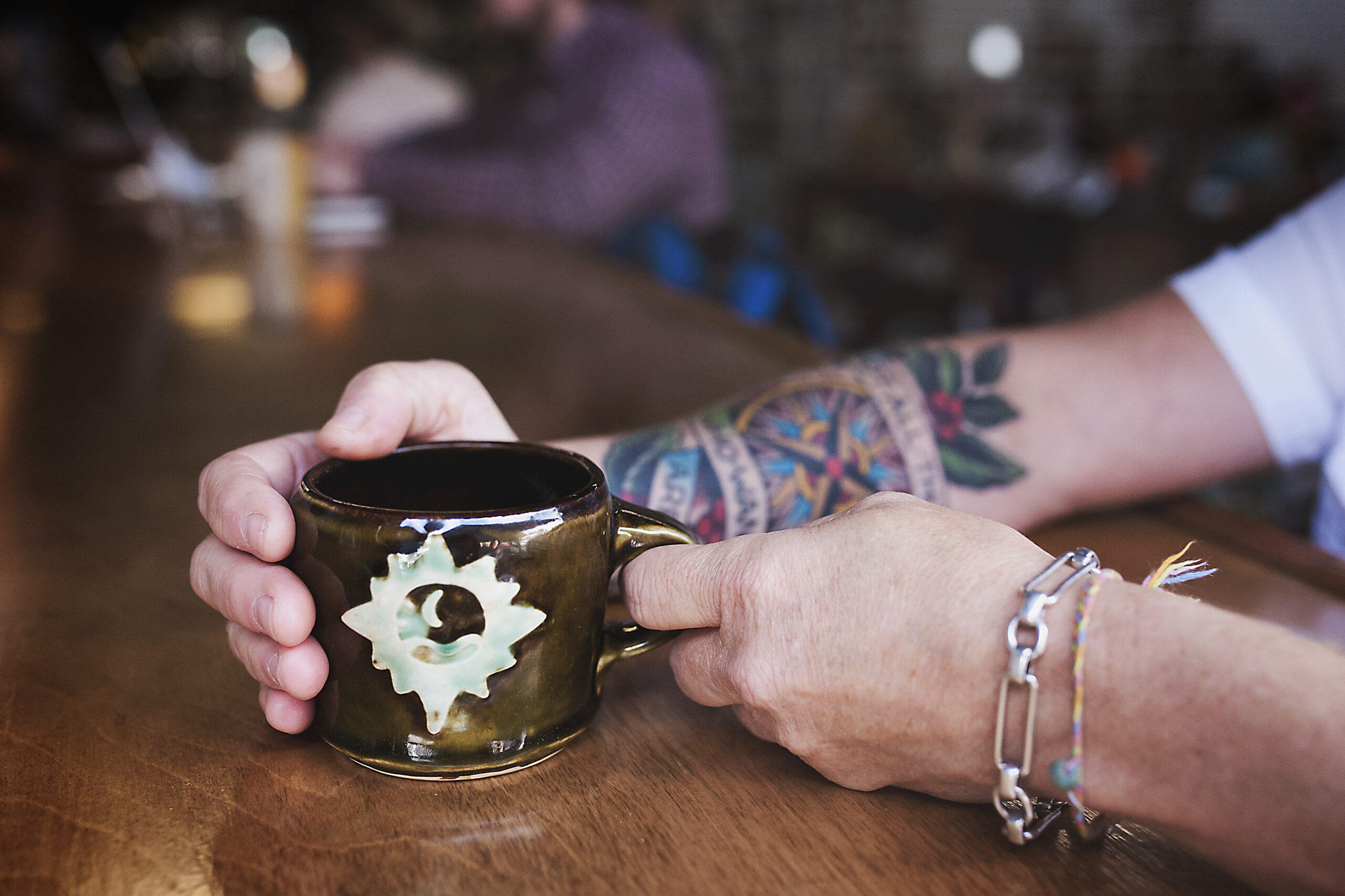 serina holding a handmade dublin coffee mug